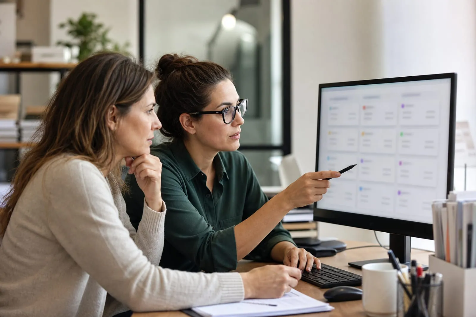 Small business managers sorting customer requests by priority
